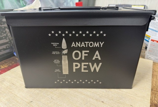 Black ammo can engraved with humorous Anatomy of a Pew design