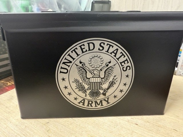 Black ammo can engraved with the United States Army seal